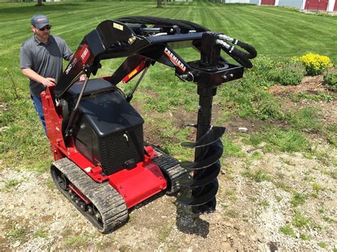 small skid steer with auger attachment|caterpillar skid steer auger attachment.